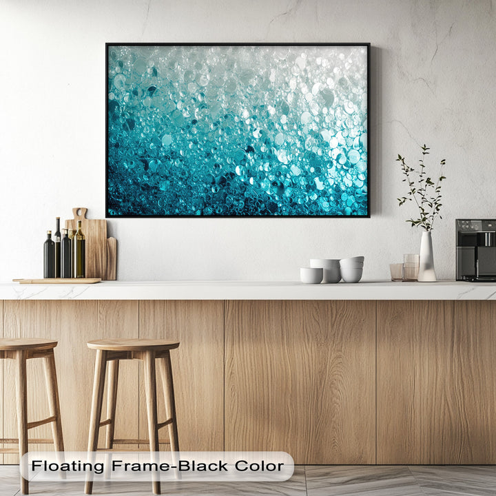 A textured off-white wall provides a minimalist background for the premium canvas decor showcasing a turquoise bubble abstract water texture art.