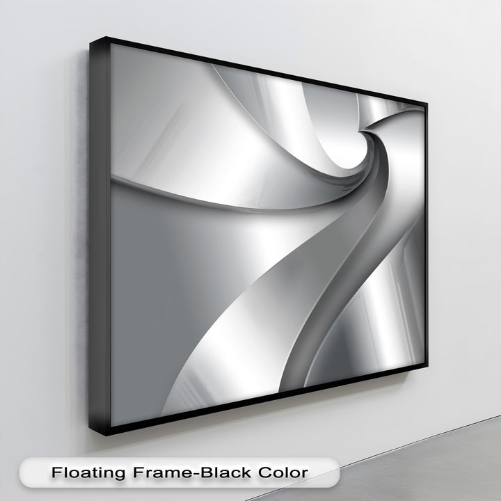 Dynamic silver and gray abstract forms create a compelling canvas painting, showcasing elegant metallic curves in a black floating frame.