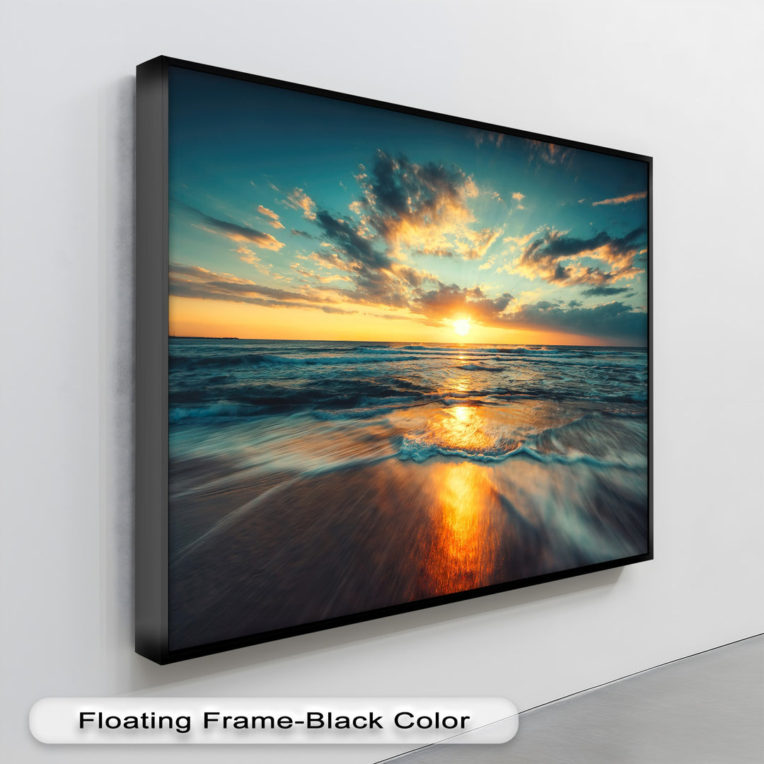Exquisite depth in this canvas wall decor reveals layered clouds, a golden ocean sunset, and waves reflecting light on wet sand.
