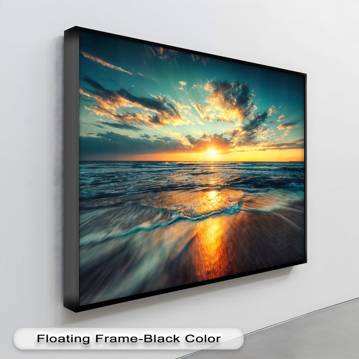 Radiant golden light and dramatic shadows from an ocean sunset reflect on the rolling surf and wet sand in this stunning hanging canvas print.