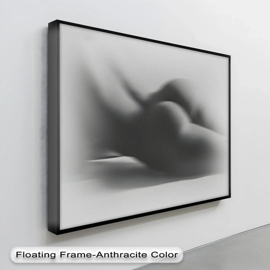 Blurring lines suggest fluid movement in this abstract nude silhouette canvas art print, a monochrome depiction of a veiled form.