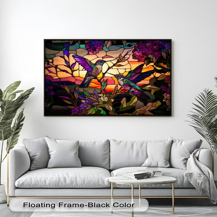 The realistic detail of this big canvas prints piece showcases two vibrant hummingbirds amidst intricate stained glass floral art and a radiant sunset.