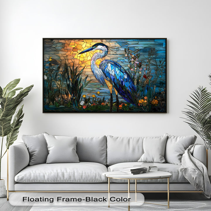 The intricate focal point is a vibrant blue stained glass heron, a premium canvas decor piece with glowing sunset hues amidst nature's reeds.