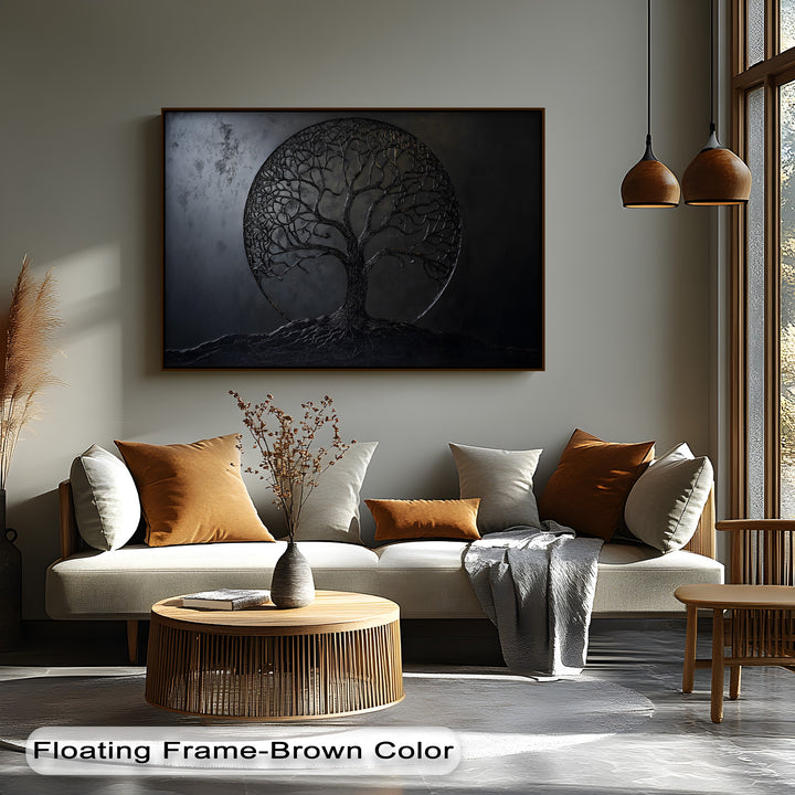 The brightest area, a sun-drenched floor near a large window, beautifully frames the striking black tree canvas artwork.