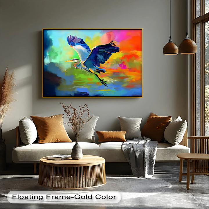 Flight of Radiance – Blue Heron in Vibrant Skies Canvas Print - MyPhotoStation