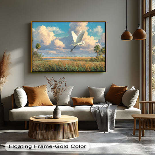 Against a backdrop of billowing clouds, the white heron coastal landscape canvas art prints features a serene nature bird scene with golden marsh grasses.