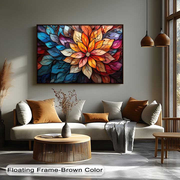 The vibrant transition between cool blue and warm orange layered petals forms a stunning stained glass flower canvas wall art with a jewel center.