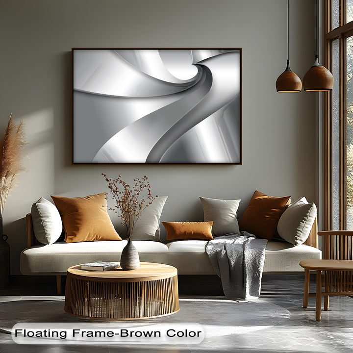 The unique canvas print exhibits striking color contrast between luminous silver curves and deep gray gradients, starkly set against warm brown furnishings.