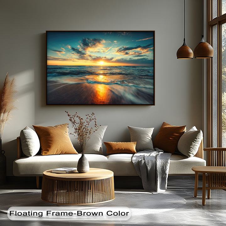 Capturing the vibrant transition of radiant golden hues melting into deep azure across this peaceful beach canvas art ocean sunset.