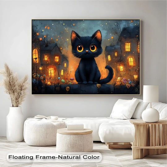 Houses' windows illuminate this canvas pictures print featuring a big-eyed black kitten sitting above a wall in a Halloween town.