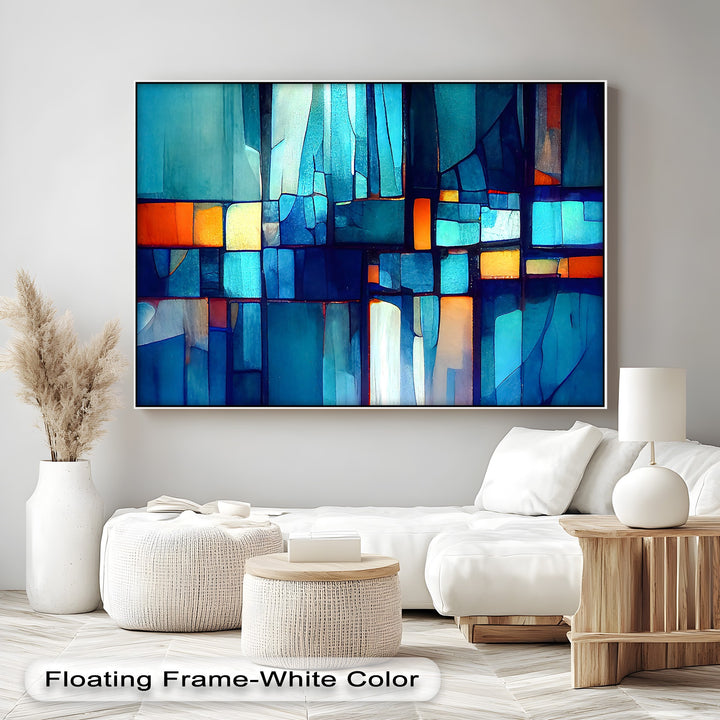 The realistic detail of this unique canvas print showcases a modern blue mosaic abstract with vibrant stained-glass turquoise and orange accents.