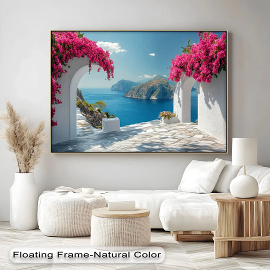 Shadows accentuate the texture of the stone patio in this coastal hanging canvas print, highlighting the contrast against the bright Mediterranean landscape and pink bougainvillea.