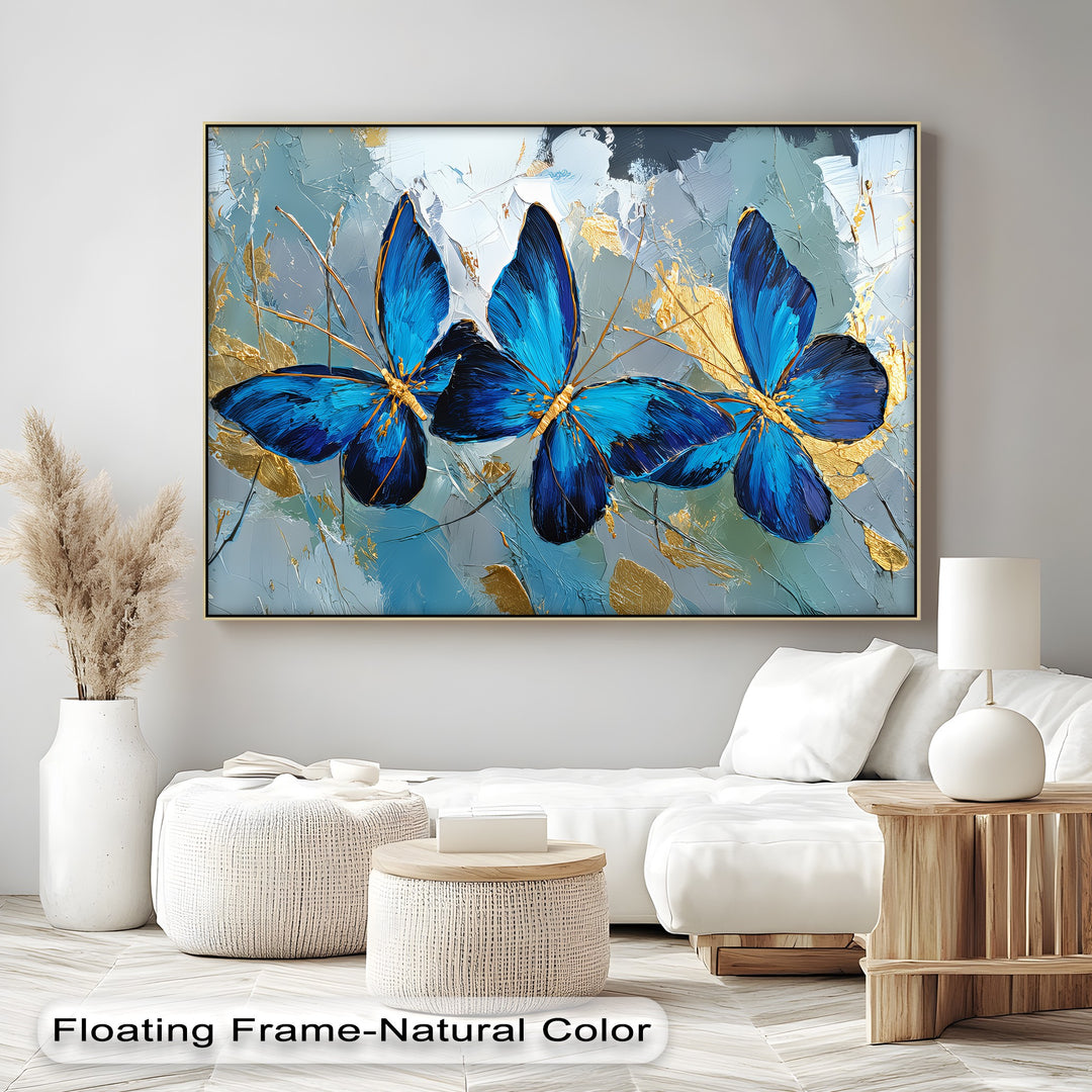 Trio of Radiance – Bold Blue Butterfly Canvas Print