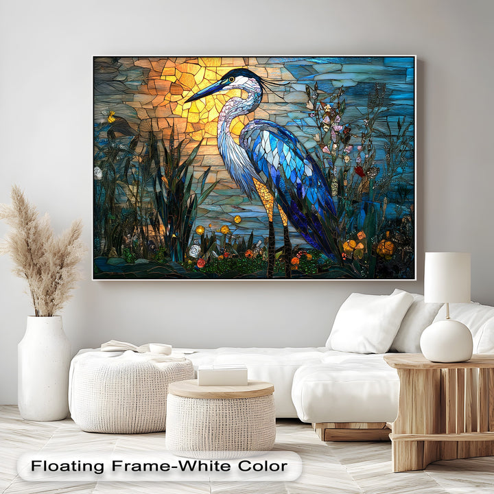 The layering effect in this colorful stained glass heron canvas painting beautifully renders blue feathers against a warm, vibrant sunset.