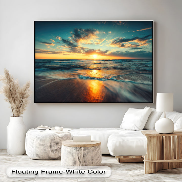 Expansive negative space on a bright wall accentuates the vibrant golden ocean sunset canvas art prints, creating a peaceful ambiance.