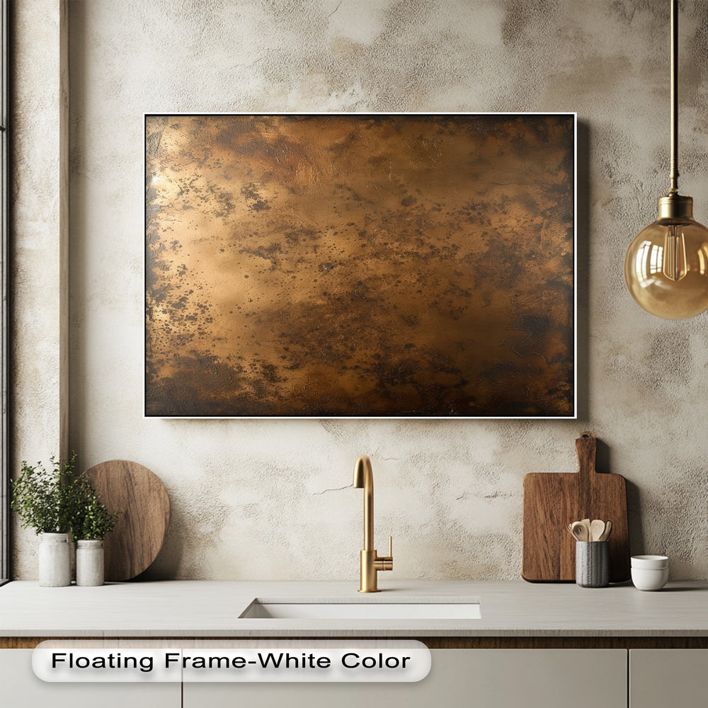 A crisp foreground captures a modern kitchen counter with a gold faucet, accentuating the hanging canvas of abstract rustic metallic bronze texture.