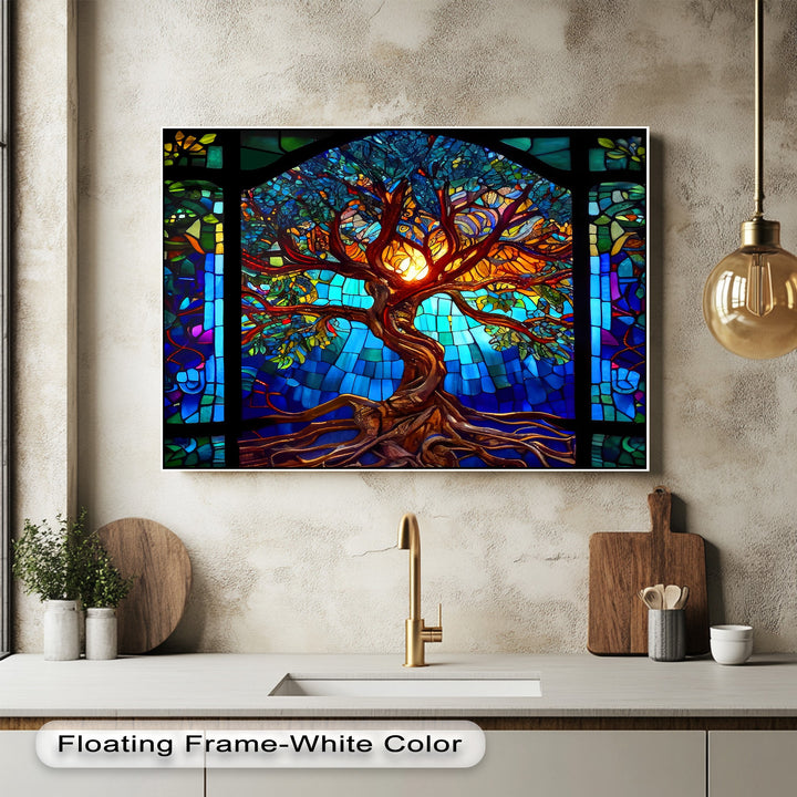 The foreground features a sleek kitchen counter with a golden faucet and various kitchen items, complementing the vibrant stained glass tree canvas wall decor.