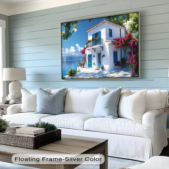 Depicting a coastal scene, the deepest shadow defines the shape of the unique canvas print capturing a sunlit Mediterranean house with vibrant flowers.