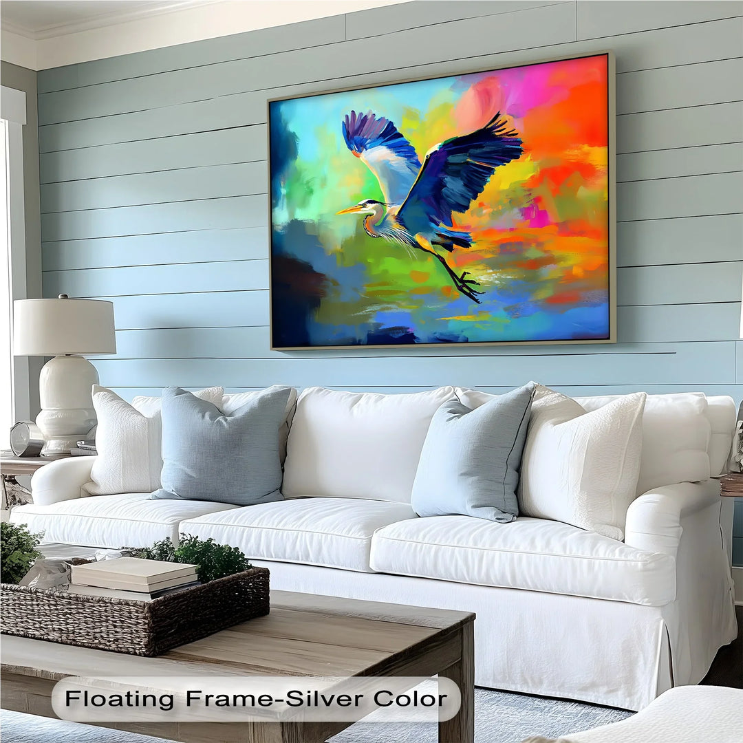 Flight of Radiance – Blue Heron in Vibrant Skies Canvas Print - MyPhotoStation