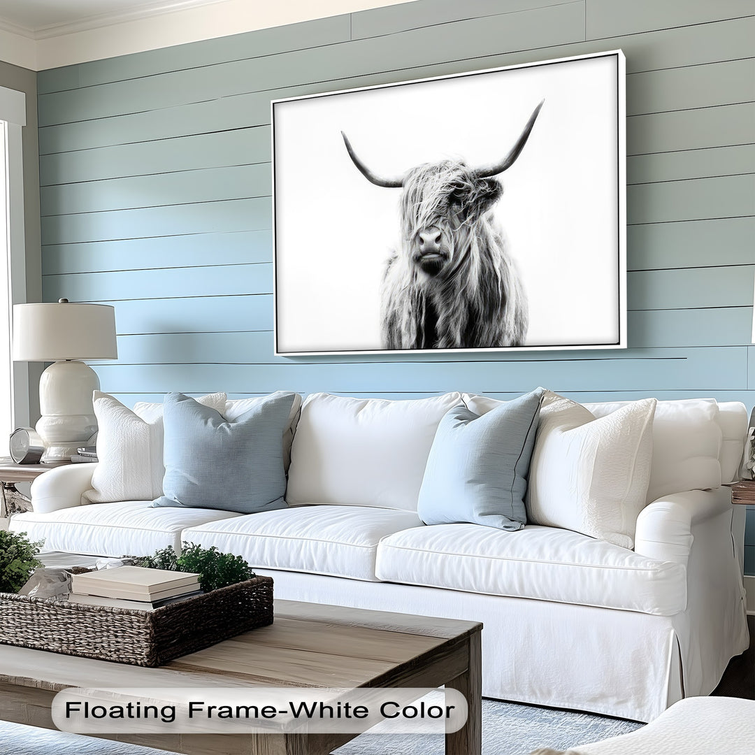 The brightest area showcases the crisp white background of the best canvas prints, featuring a minimalist Highland Cow with shaggy fur and striking curved horns.