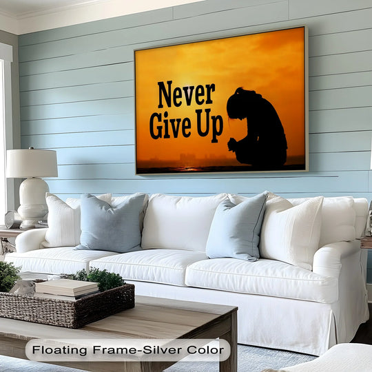 A woven basket with books and greenery adorns the coffee table in the foreground, enhancing the view of the inspirational 'Never Give Up' hanging canvas above.
