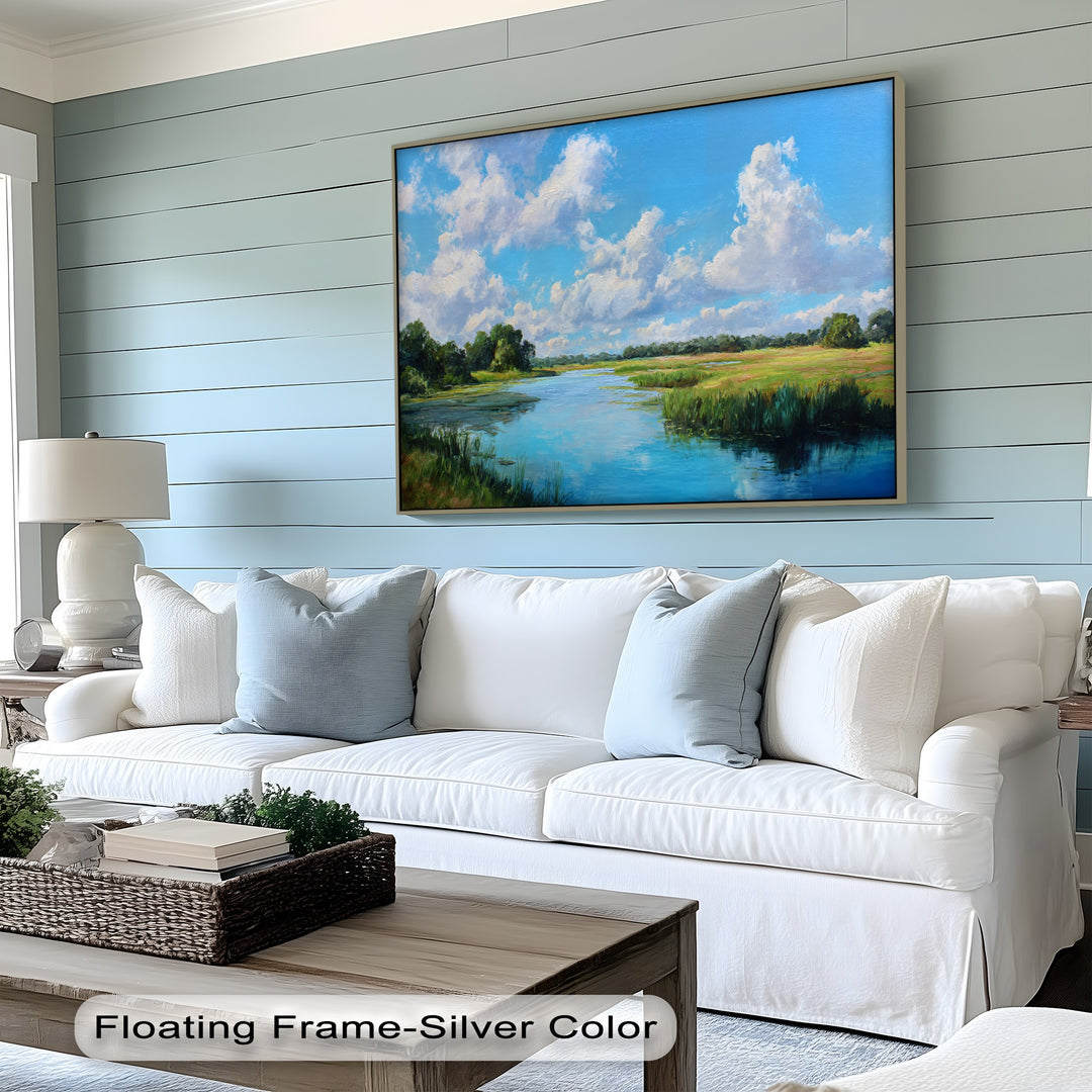 Negative space above the serene nature canvas artwork highlights the vibrant blue sky and river of this Peaceful River Landscape Canvas Print.