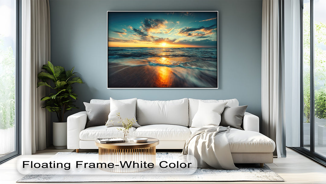 A captivating canvas painting showcases a golden ocean sunset with the sun reflecting intensely on the wet sand and crashing waves.