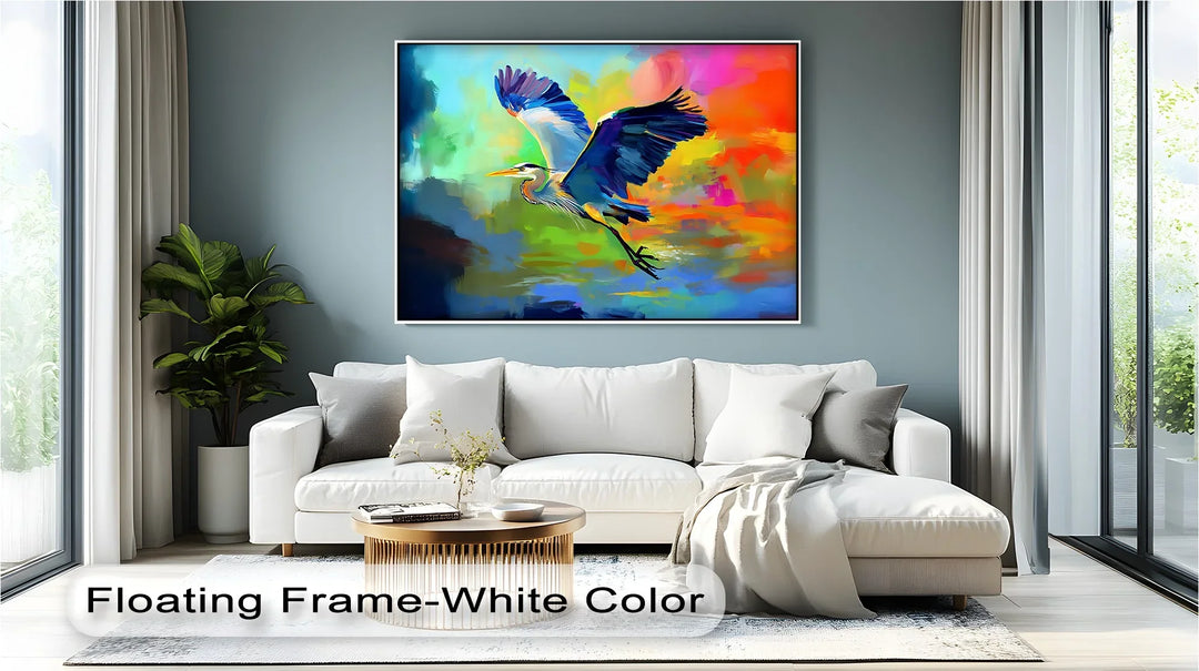 Flight of Radiance – Blue Heron in Vibrant Skies Canvas Print - MyPhotoStation