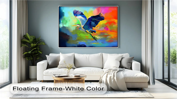 Flight of Radiance – Blue Heron in Vibrant Skies Canvas Print - MyPhotoStation