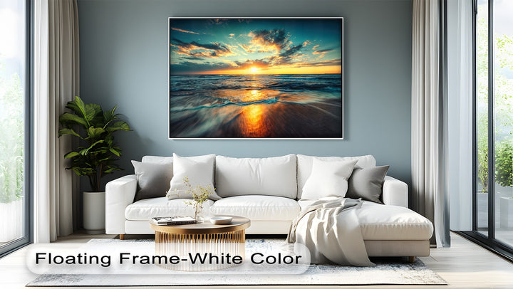 The foreground of this premium canvas decor showcases ocean waves gently washing onto the golden, wet sand, reflecting the vibrant sunset.