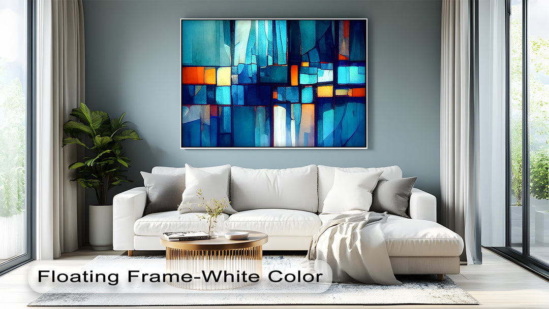Radiant light streams through large windows, enhancing the luminous blue mosaic canvas pictures with geometric blocks of turquoise and amber.