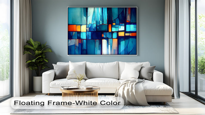 Radiant light streams through large windows, enhancing the luminous blue mosaic canvas pictures with geometric blocks of turquoise and amber.