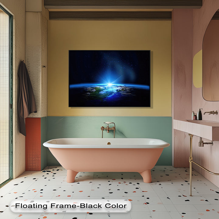 The elegant peach bathtub and speckled terrazzo floor complement the striking Earth From Space canvas painting hanging above.