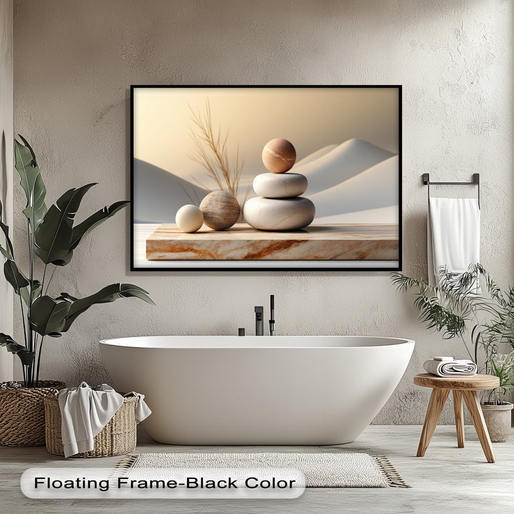 The unique canvas print's smooth finish elegantly displays a zen stone balance, framed in black as minimalist spa wall art.