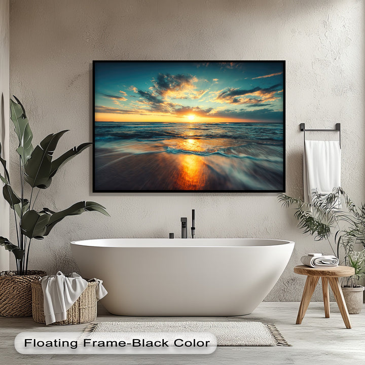 The hanging canvas displays a vibrant, warm color temperature, with golden ocean sunset hues reflecting on the serene beach water.