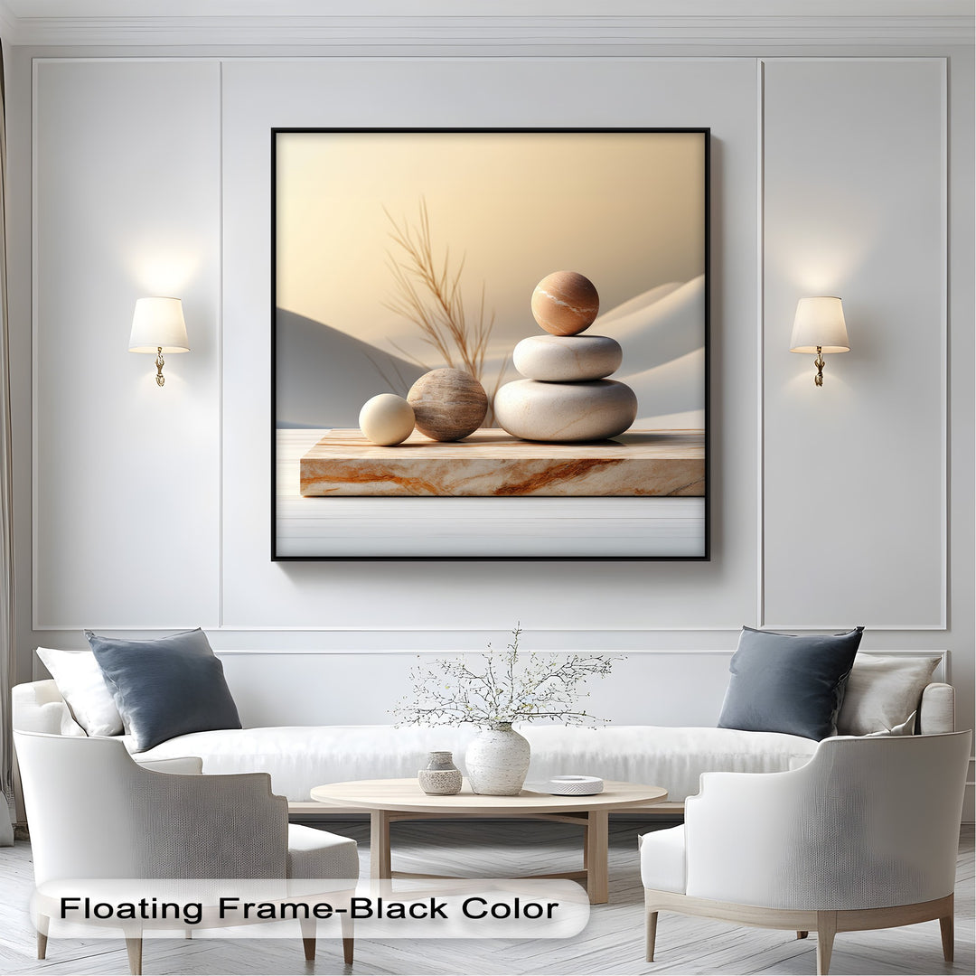 A minimalist canvas art print showcases balanced river stones in serene, warm neutral tones on a wooden plank against a soft desert landscape.