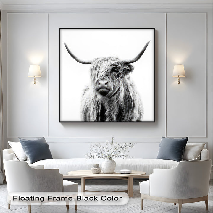The focal point is a minimalist black and white Highland Cow canvas print, highlighting its shaggy fur and curved horns for unique canvas pictures.