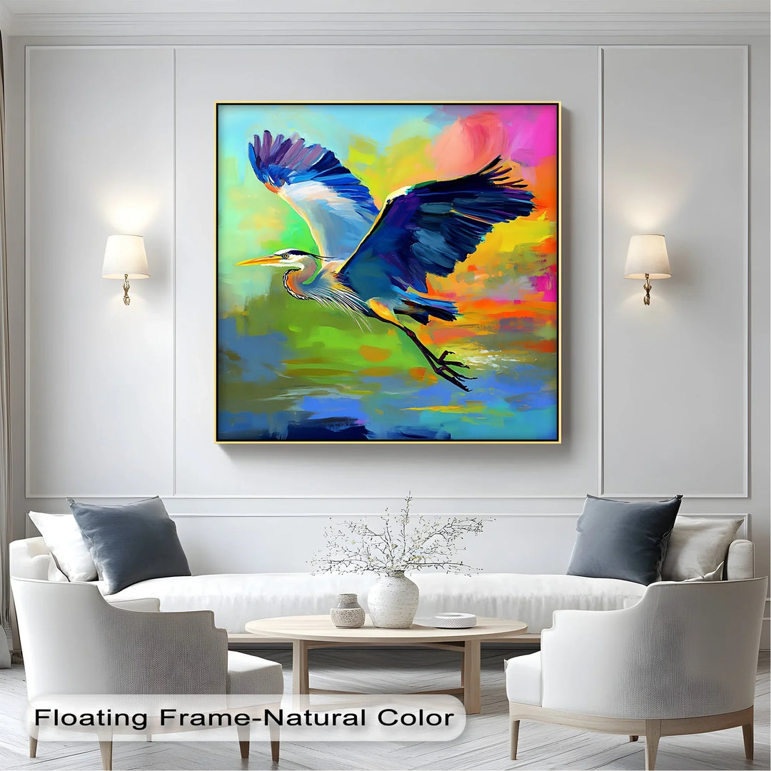 Flight of Radiance – Blue Heron in Vibrant Skies Canvas Print - MyPhotoStation