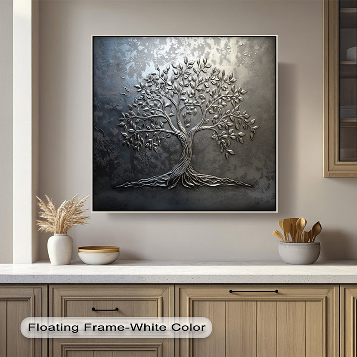 Abstractly rendered silver tree canvas art features a striking metallic texture, its sculpted leaves and roots emerging from a distressed, dark background.