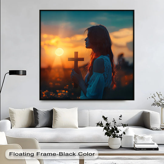 Canvas print featuring a woman holding a cross against sunset sky ideal Jesus wall art for religious decor and faith based interior designs