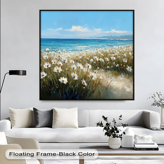 Contrasting geometric elements define this framed coastal canvas artwork print, with a rectangular black frame surrounding the square field of daisies and the distant horizon line.