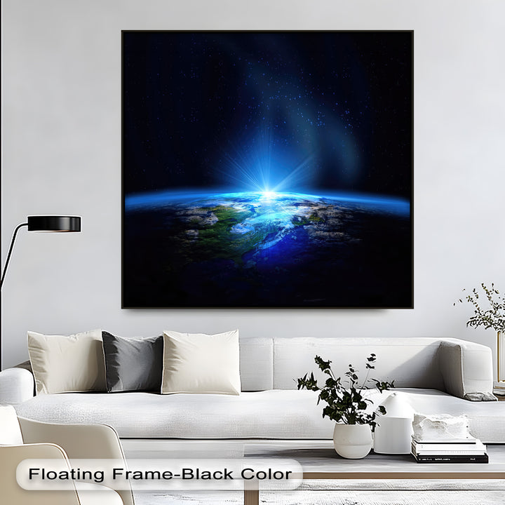 The crisp white negative space of the room's wall amplifies the dramatic depth of the Earth From Space cosmic blue planet big canvas prints.