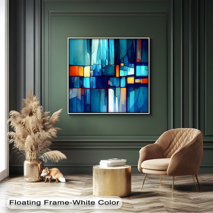 The sleek, modern finish of the crisp white floating frame beautifully complements the abstract blue mosaic framed canvas.