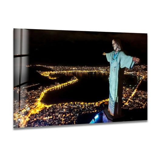 The stillness of night surrounds Christ the Redeemer in this glass wall art, an iconic landmark standing above a twinkling Rio cityscape that offers peaceful home decoration.