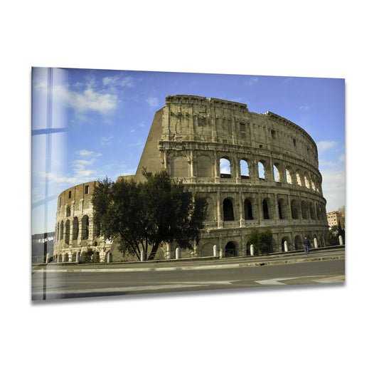 Dominating negative space emphasizes the iconic Colosseum in Rome, presented as striking glass art painting, showcasing the city's historic landmark against a bright sky.