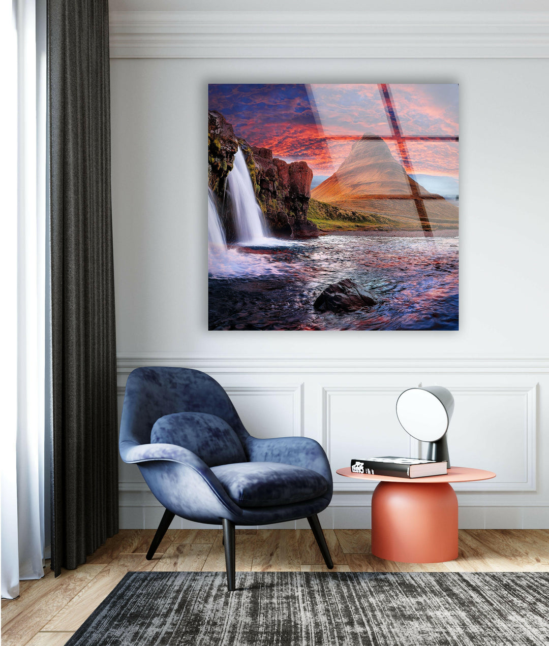 Nature-inspired wall art capturing the beauty of waterfalls and dramatic skies.
