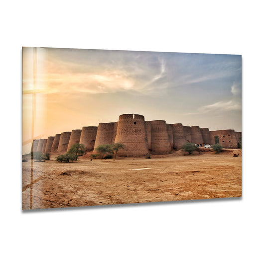 Illuminated by the sun, the best glass art captures the Fortress of Derawar, a historic landmark in the Thar Desert, showcasing its impressive structure.