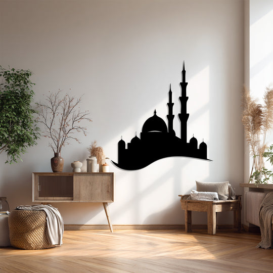 The darkest area showcases the mosque's silhouette as unique metal wall art, emphasizing its minimalist design with domes and minarets against a light wall.