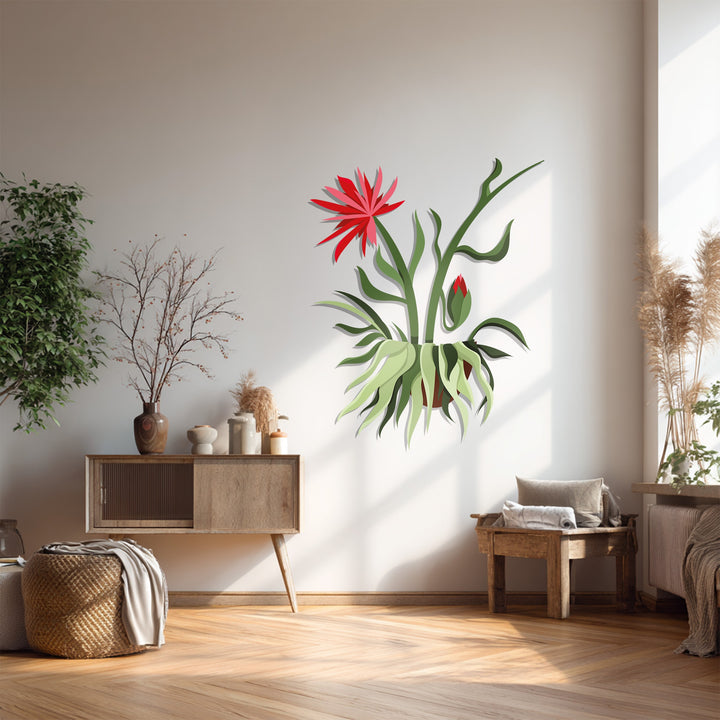 Light and shadow play across this metal art for wall depicting a red bloom hanging plant, creating a striking modern botanical wall decor.