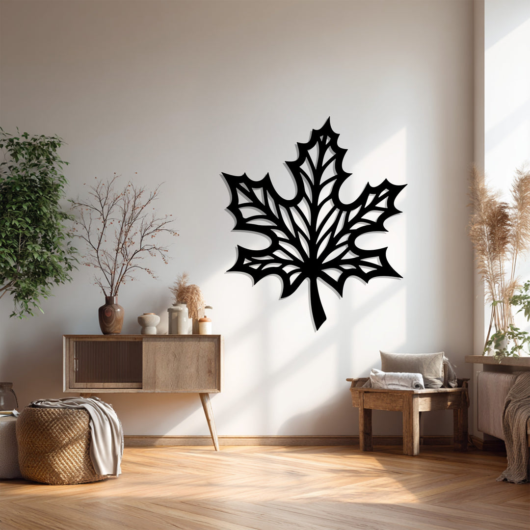 Black maple leaf decoration wall art creates a striking silhouette against the neutral wall, adding a bold, modern touch to the room's decor.